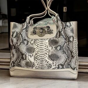 Sharif RARE Snake Embossed Handbag EUC. Leather exterior, faux suede interior